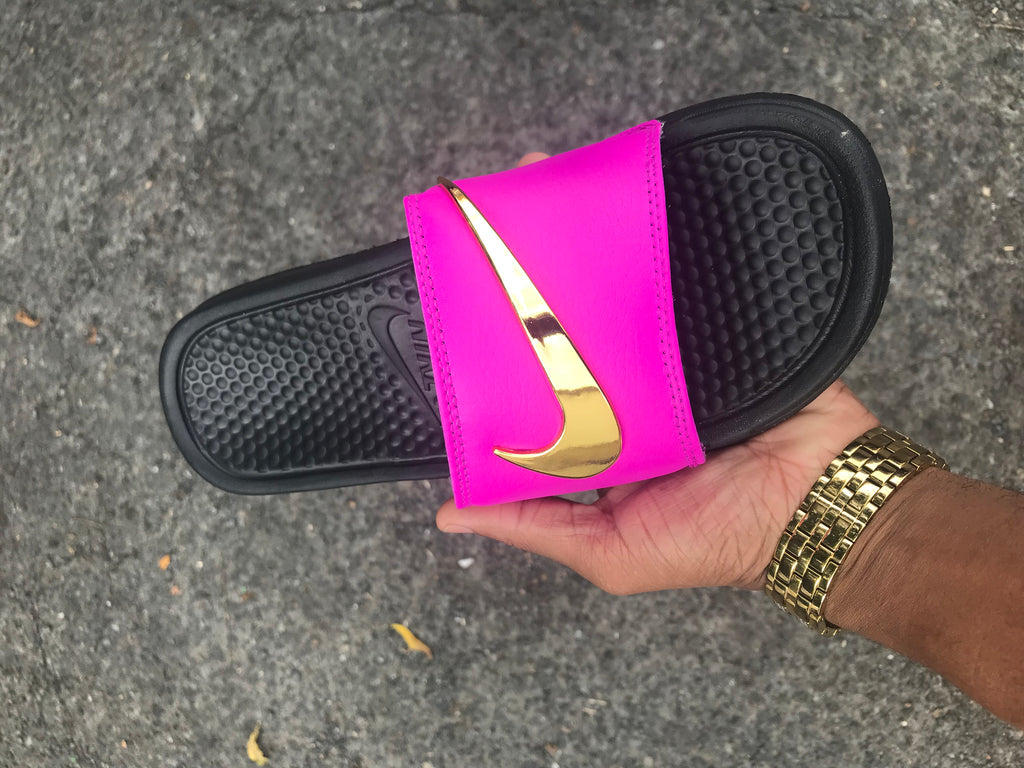 purple and gold nike slides