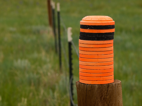 orange clay discs stacked one on top of the other