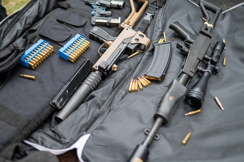 guns and bullets in range bag