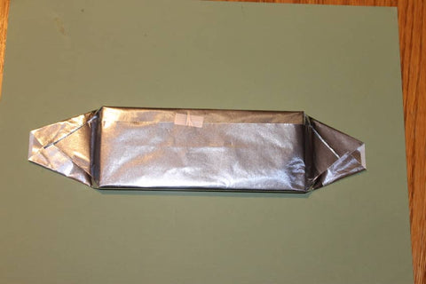 Wrapping a Hershey Bar in Foil