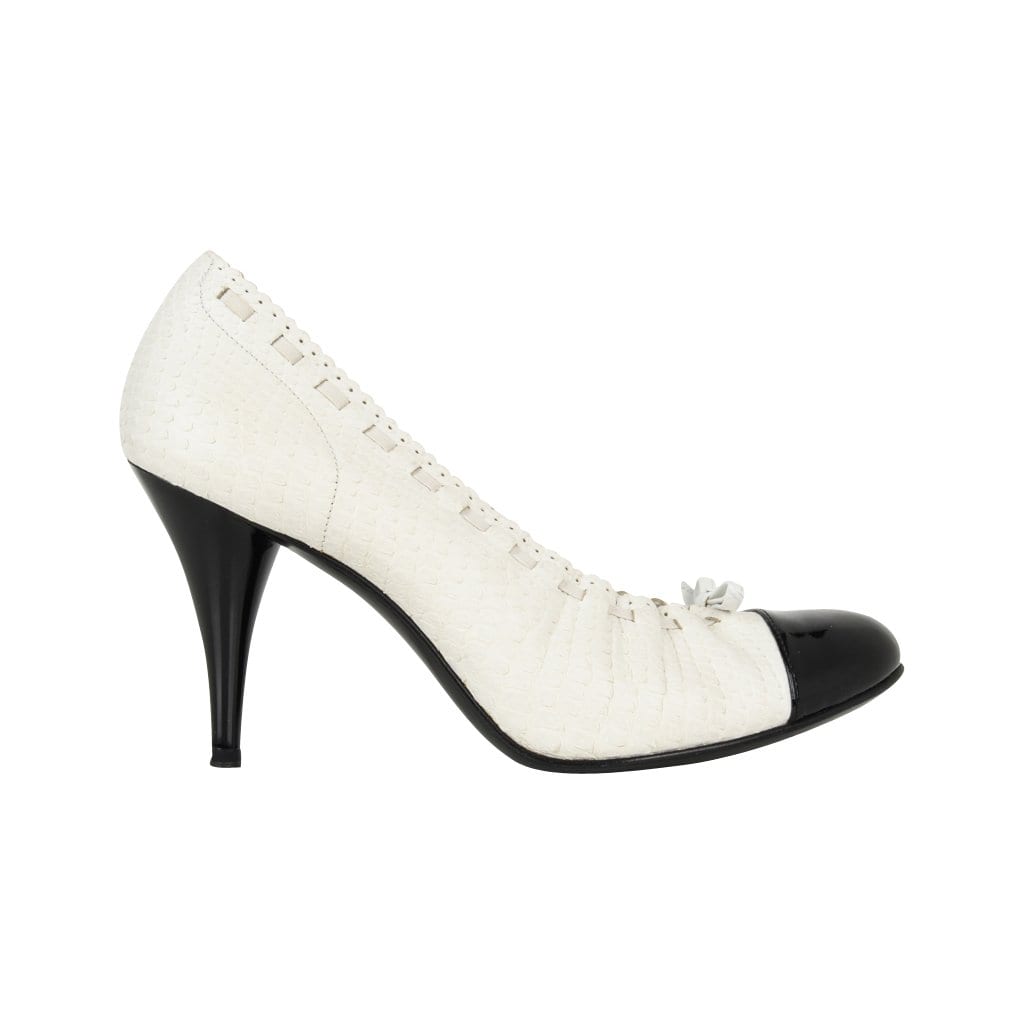 white snakeskin pumps