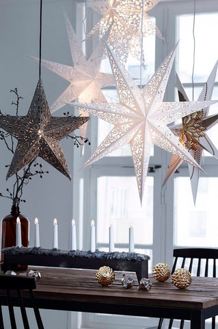 Star lights above a dining table