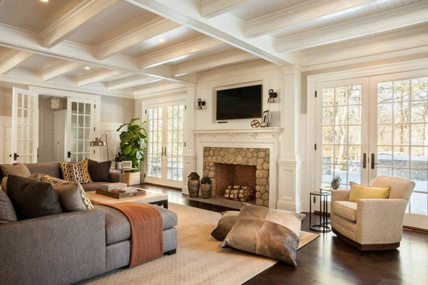 Living room with fireplace and TV