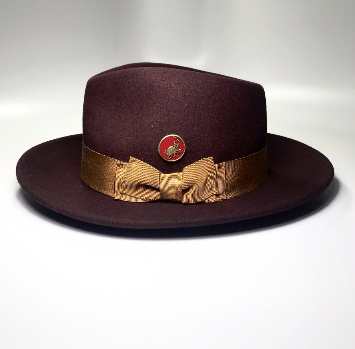 the FLAMEKEEPERS HAT CLUB MERCURY BURGUNDY/RUST HAT