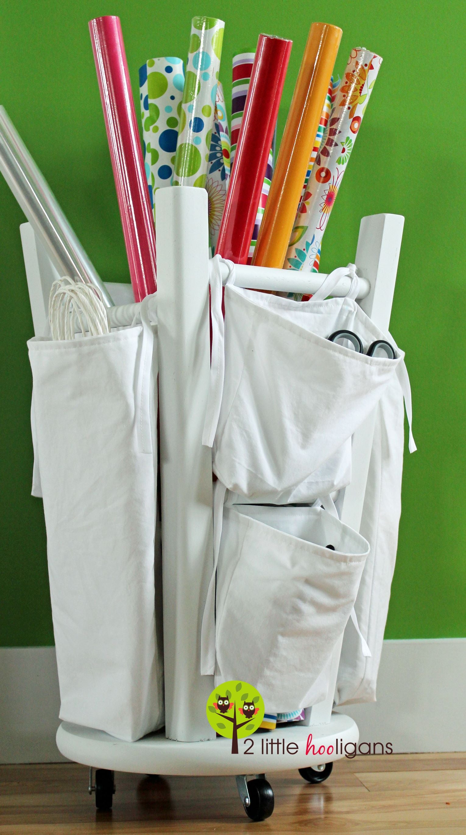 Vertical Wrapping Paper Storage from a Wood Counter Stool