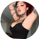 Person showing intricate henna design on their hand.