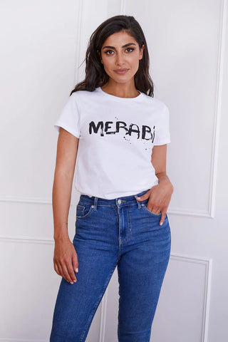 Woman wearing white t-shirt with crew neck and Merabi logo printed on the chest