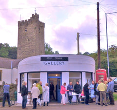 Image of people in front of building