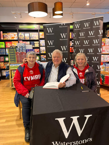 Tracey Schwass from Brisbane and Lisa Lewis from Crickhowell, with Max Boyce at the book signing table.