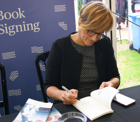 Karmele Jaio signing books at the Edinburgh Book Festival