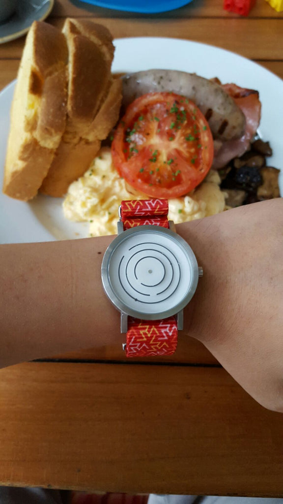 project watch with orange tangy strap