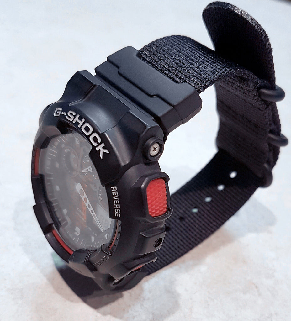 casio g-shock ga100 with vario ballistic nylon strap and casio gshock adapter