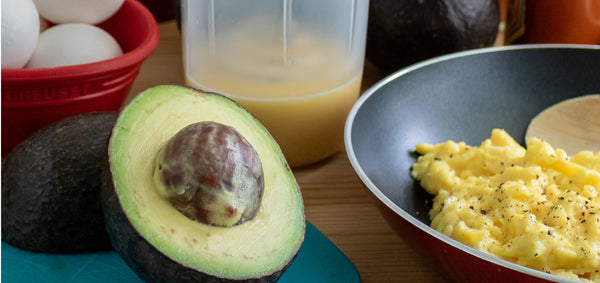 Avocado and scrambled eggs displayed in front of a Whiskware egg Mixer