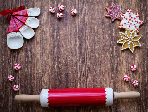 Candy cane cookies and baking utensils