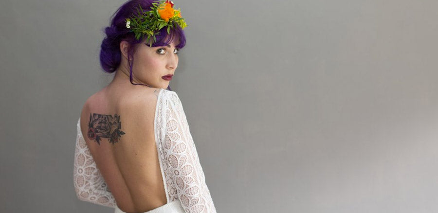 Bride with a back tattoo