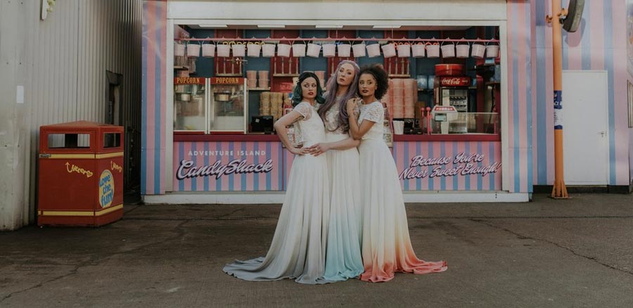 Group shot of colourful and quirky wedding dresses
