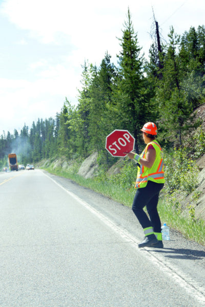 Road worker with a high-visibility hard hat