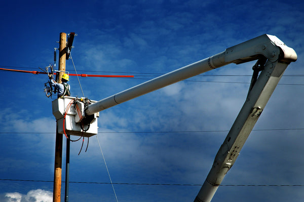 Lineman on a pole truck