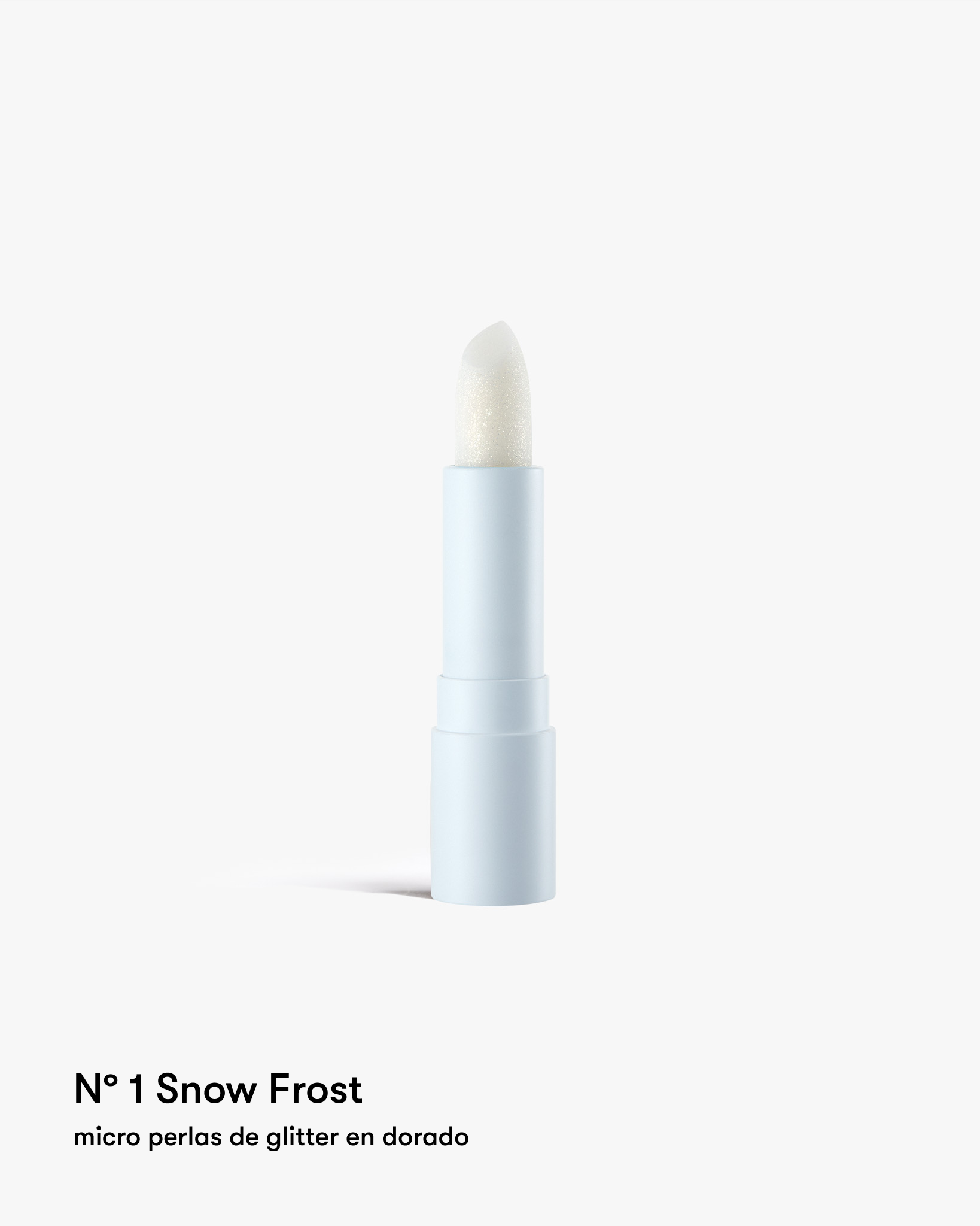Bálsamo labial hidratante con suaves partículas de brillo.Nº 1 Snow Frost: tono transparente con perlas 100% doradas, perfecto para un makeup casual donde solo resalten tus labios.