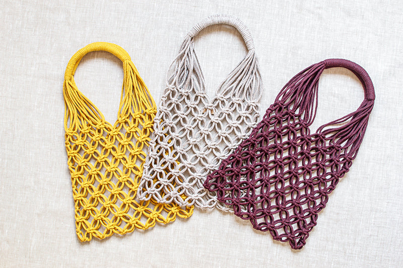 three macrame bags