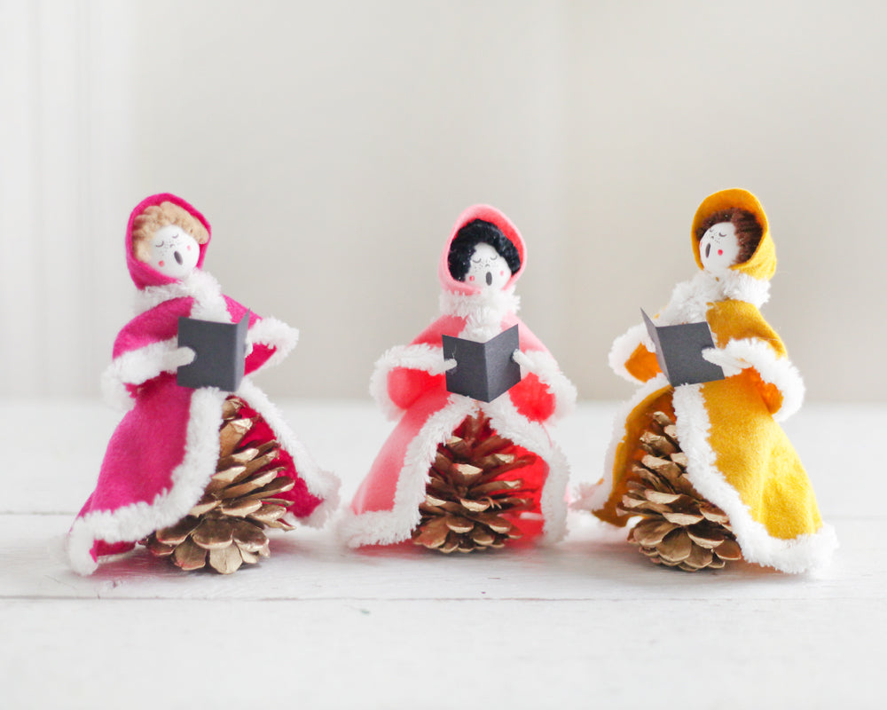 pine cone carolers