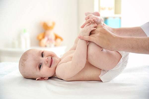 Happy baby doing lying on the floor