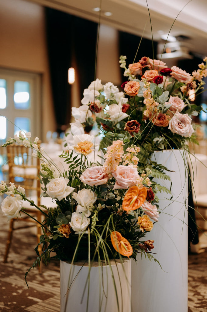 Timeless Burgundy Blush Autumn Color Wedding at Outpost Hotel - Revelry Hall. Pleated Pedestals aisle flower decor