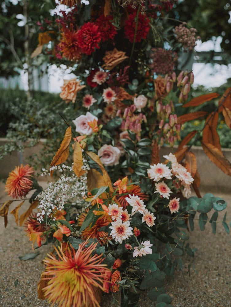 Artful Autumnal Color Palette Deconstructed Flower Arch at Artemis Singapore Wedding