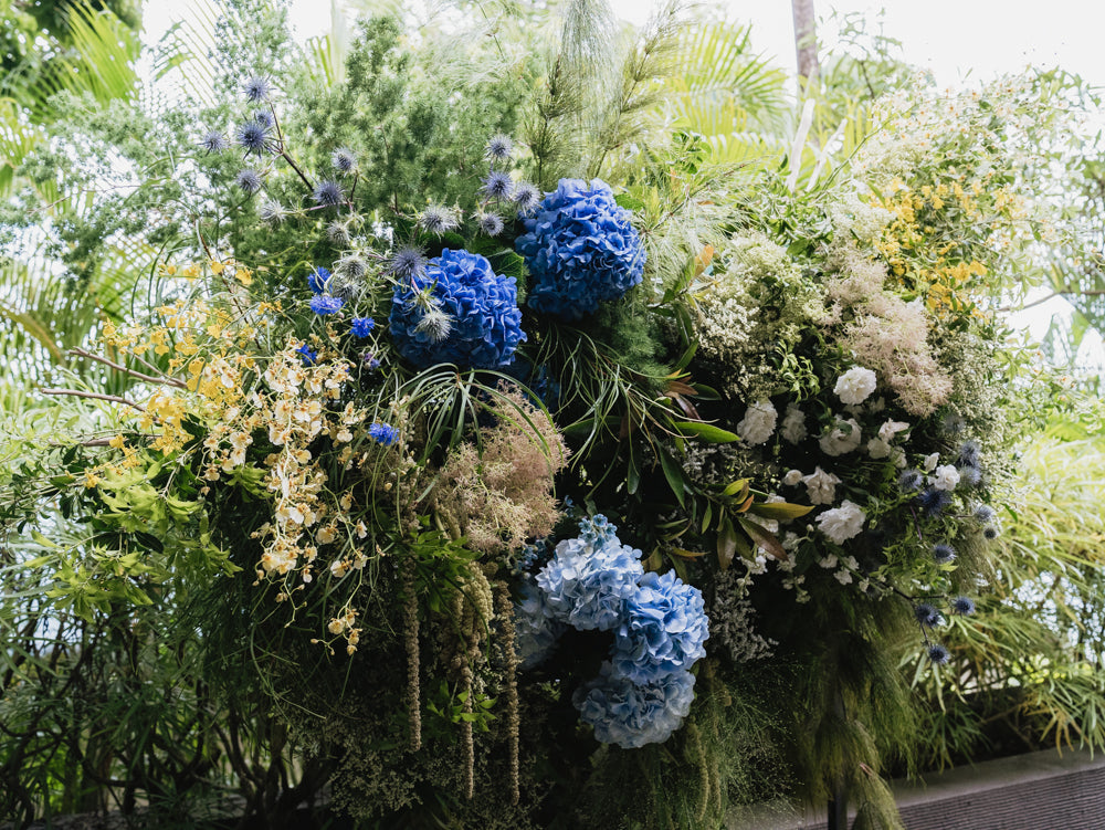 Blue and Yellow Wedding Floral Installation at Capella Villa