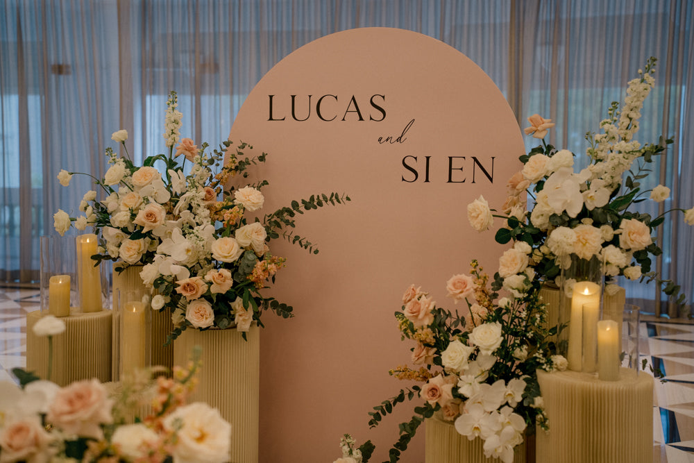Elegant dome-shaped floral backdrop at Raffles Hotel's Jubilee Hall ballroom
