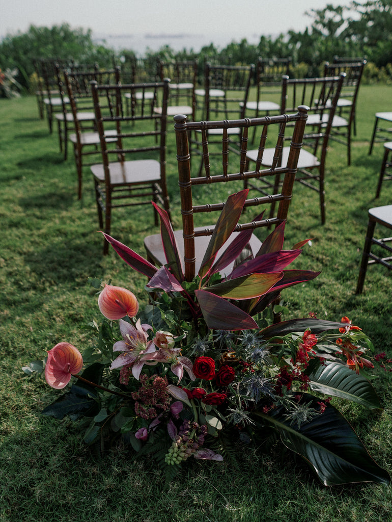 Tropical Elegance Red & Blush Floral Installation for an outdoor wedding at Panamericana Sentosa Singapore. 