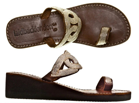 https://www.feathersofitaly.co.uk/collections/sandals/products/carson-wedge