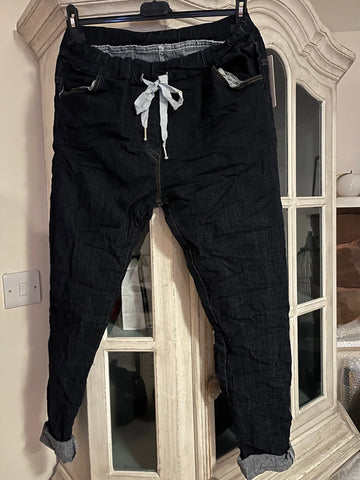 https://www.feathersofitaly.co.uk/collections/trousers/products/amazing-woman-crinkle-jeans-in-denim-with-draw-string-waist