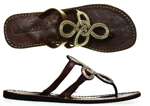 https://www.feathersofitaly.co.uk/collections/sandals/products/edie-flat-leather-sandal