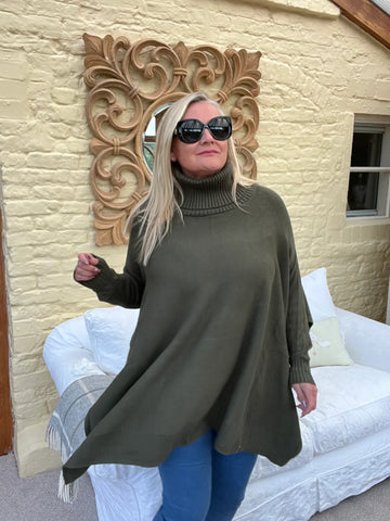 https://www.feathersofitaly.co.uk/products/milan-poncho-tunic-jumper-khaki-green?_pos=4&_sid=c7389cee1&_ss=r