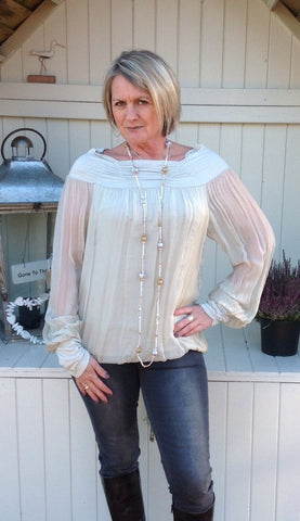 https://www.feathersofitaly.co.uk/collections/tops/products/luccia-silk-top-in-stone