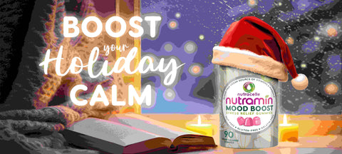 Bottle of Nutramin Mood Boost gummies with santa hat and text that says Boost your Holiday Calm anti stress gummies