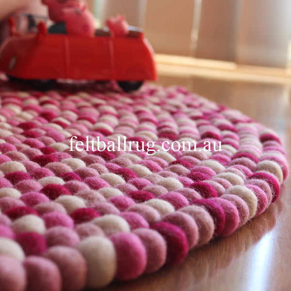 pink felt ball rug