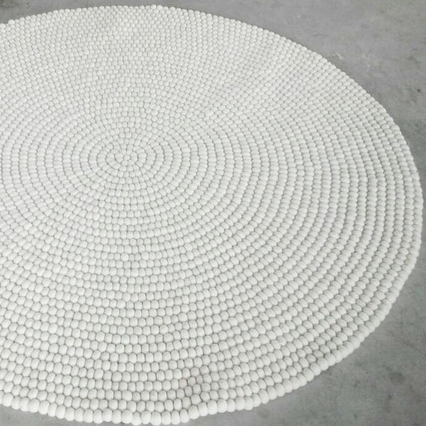 white felt ball rug