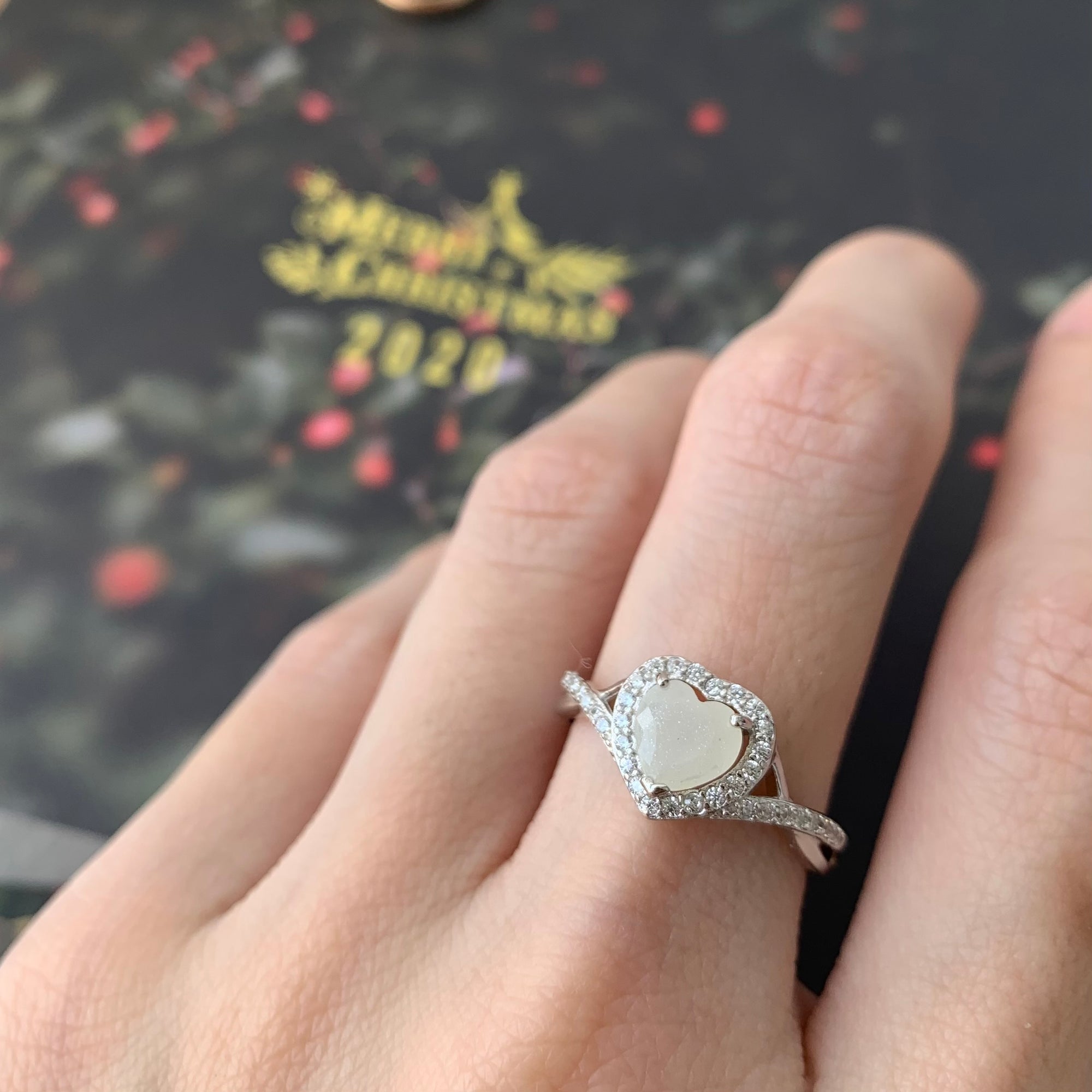 SOLITAIRE: NOELLE RING WITH HEART SHAPED INCLUSION STONE
