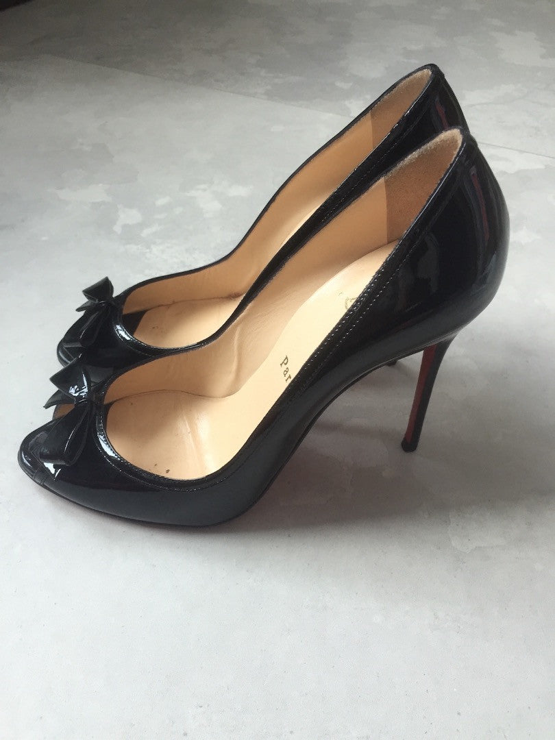 black patent louboutin heels