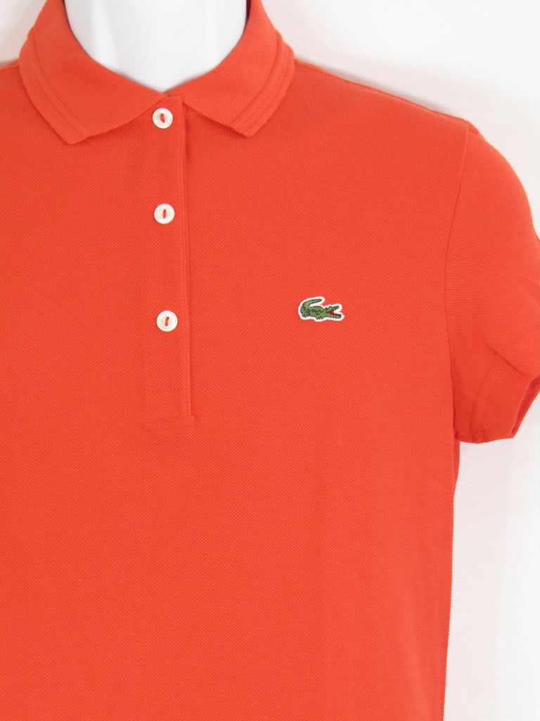 orange lacoste shirt