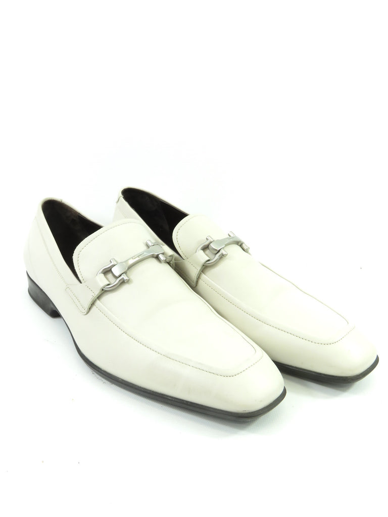 white and silver loafers