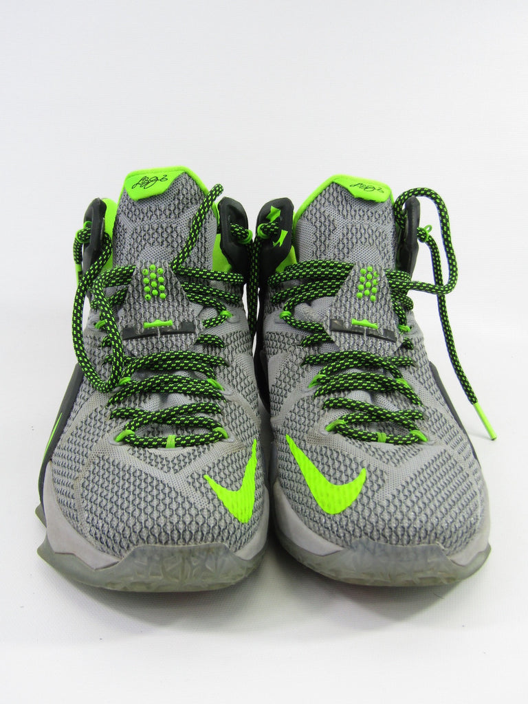 grey and neon green nike shoes