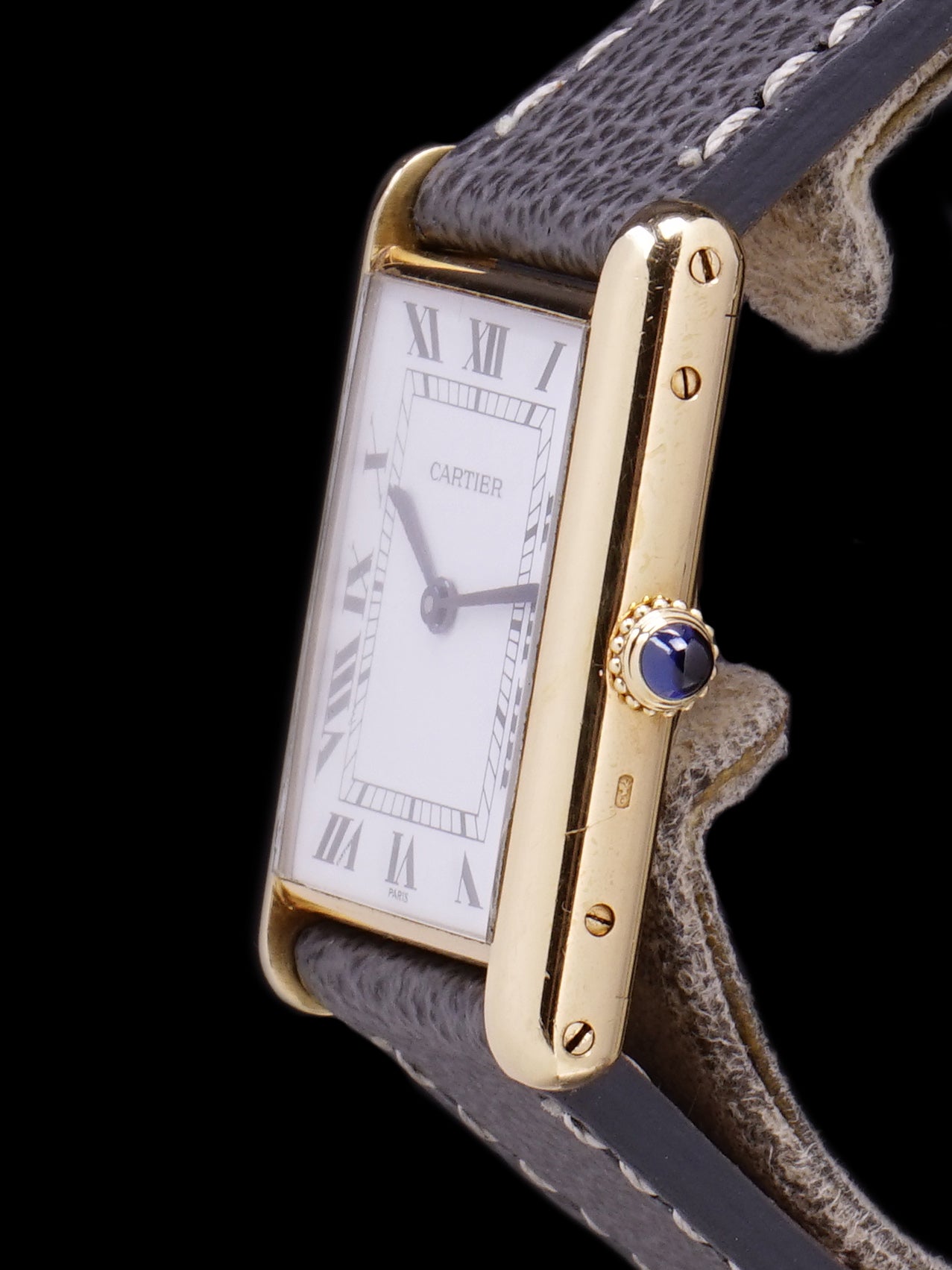 cartier tank watch not keeping time