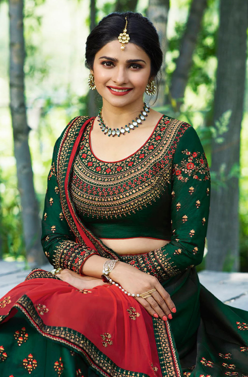 red and green bridal lehenga