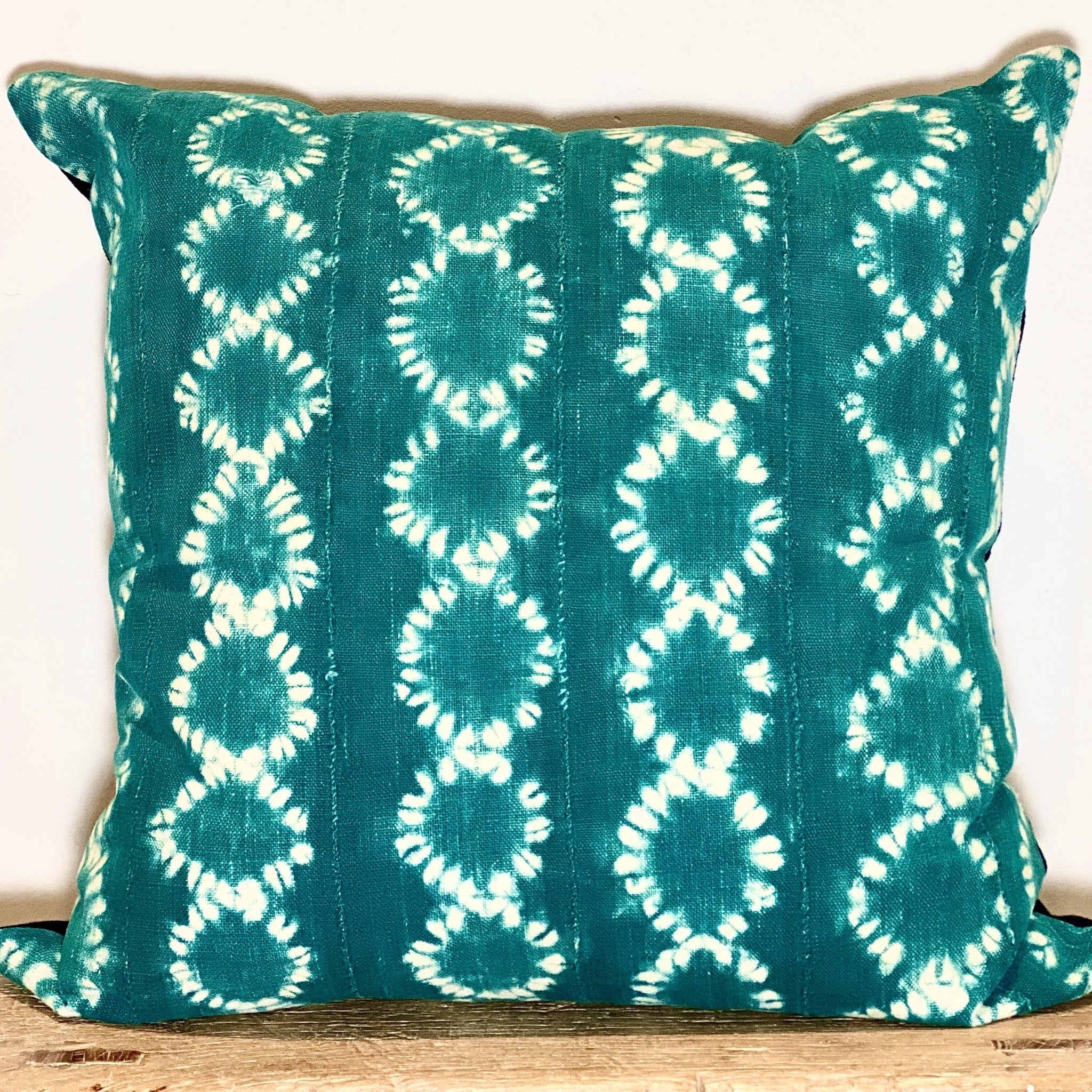 teal and white throw pillows