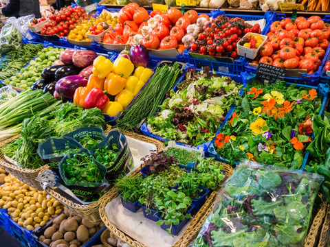 Colorful array of fresh vegetables and herbs at St. Pete's Farmers Market.