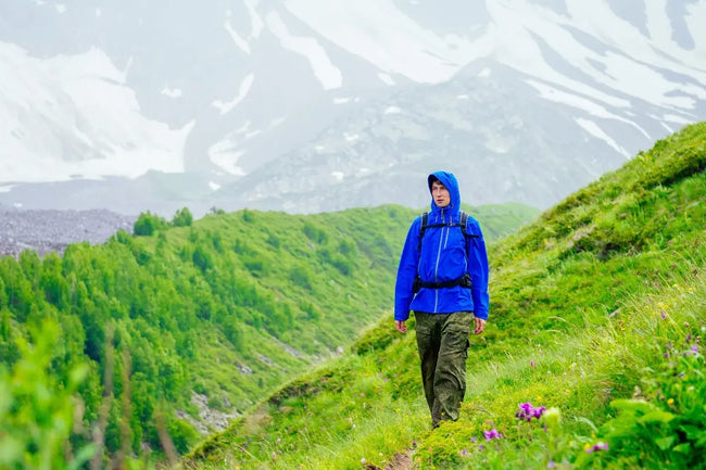 man hiking in his waterproof boots