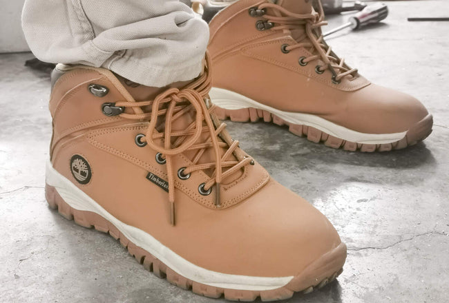man's legs in comfortable timberland boots